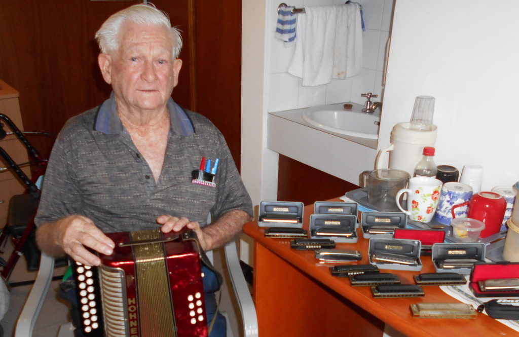 Bill Flynn with all of his harmonicas