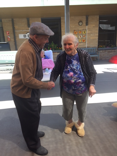 Aged care residents take time for a dance at Regis Ringwood