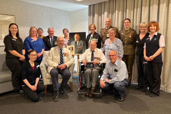Cecil Ireland with family, employees, and ADF members
