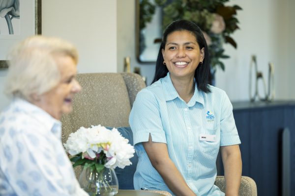 Irene with resident at Regis Camberwell