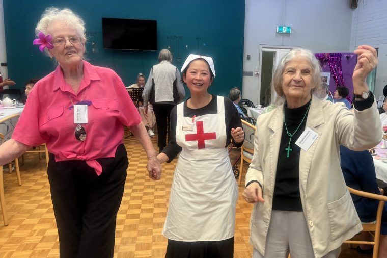 Dancing at the inter-home Mother's Day high tea